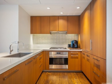 Two parking stalls. Four storage lockers. One bedroom. In - photo 3