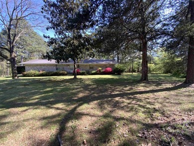 BEAUTIFUL LARGE CORNER PROPERTY!!! This well maintained brick - photo 2
