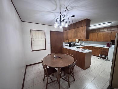 BEAUTIFUL LARGE CORNER PROPERTY!!! This well maintained brick - photo 6