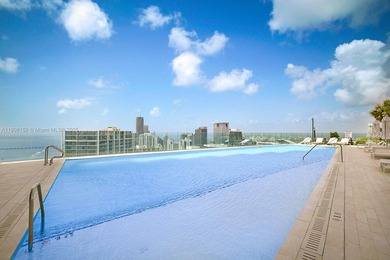 HAPPY HOLIDAYS!! New Construction!! Aston Martin Residences with