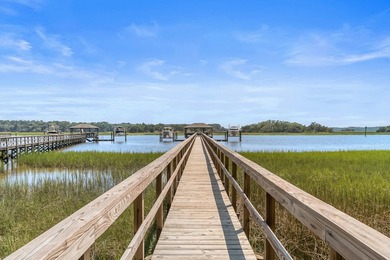 Beyond the gates of Stono Ferry, where manicured fairways - photo 16