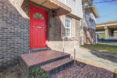 Partially renovated two-story home in a great location! Walk to - photo 2