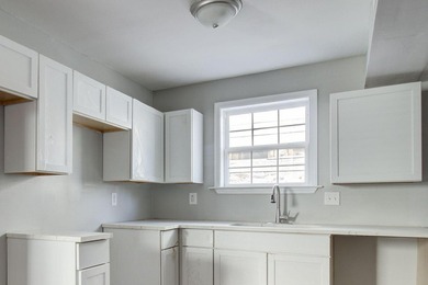 Partially renovated two-story home in a great location! Walk to - photo 9