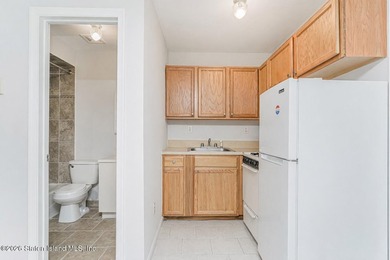 2 FAMILY Home HAS A 3 BEDROOM MAIN Unit & A 1 BEDROOM BASEMENT - photo 23