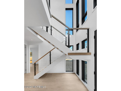 Experience unobstructed panoramic water views of the Manhattan - photo 4