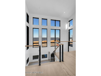 Experience unobstructed panoramic water views of the Manhattan - photo 5