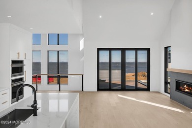 Experience unobstructed panoramic water views of the Manhattan - photo 6