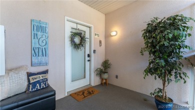 Perfectly positioned on Lake of the Ozarks, this stunning