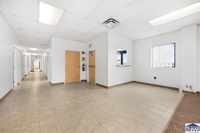 Office area with 4 private offices, large area for cubicles