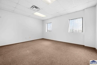 Office area with 4 private offices, large area for cubicles