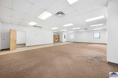 Office area with 4 private offices, large area for cubicles