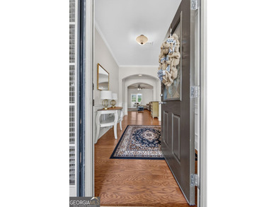 This charming 3-bedroom, 2-bath home is nestled in the sought - photo 7