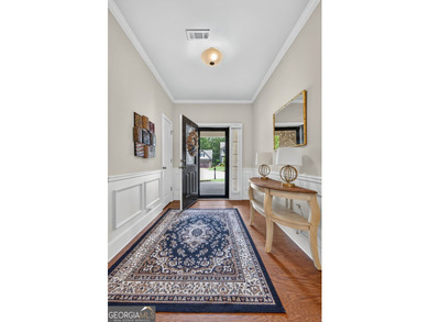 This charming 3-bedroom, 2-bath home is nestled in the sought - photo 8