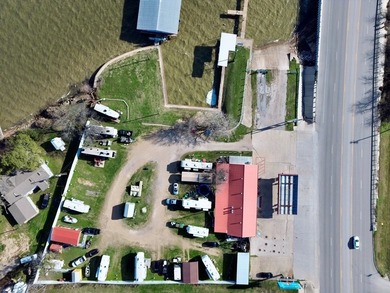 Causeway Marina & RV Park! Spanning 7.72 acres, this property - photo 2