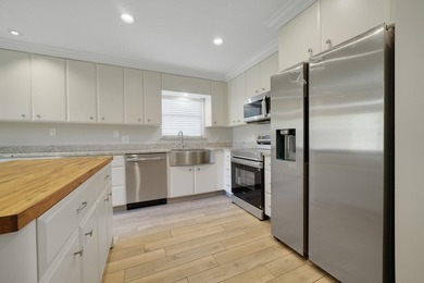 A rare opportunity to own this prime East Boca duplex. Brand new - photo 2
