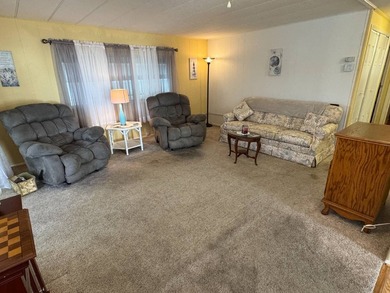 This 1971 home is offered turnkey and includes the golf cart! - photo 13