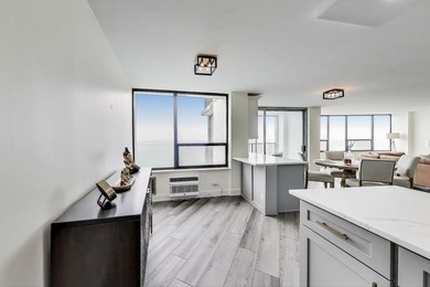 Experience breathtaking, unobstructed lake views from every room - photo 14