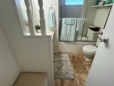 This 1971 home is offered turnkey and includes the golf cart! - photo 21