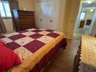 This 1971 home is offered turnkey and includes the golf cart! - photo 25