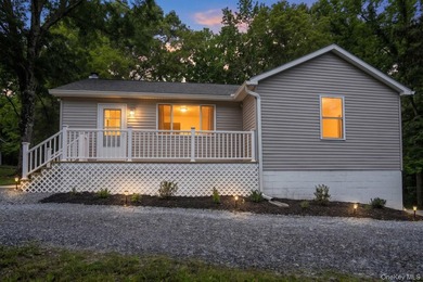Escape to your own private retreat with this beautifully updated - photo 1