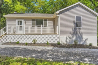 Escape to your own private retreat with this beautifully updated - photo 2