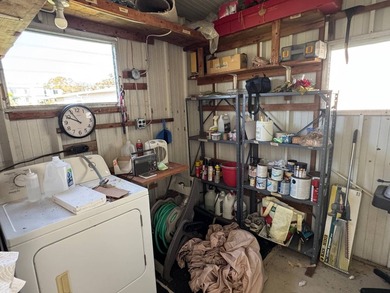 This 1971 home is offered turnkey and includes the golf cart! - photo 32