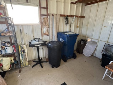This 1971 home is offered turnkey and includes the golf cart! - photo 33