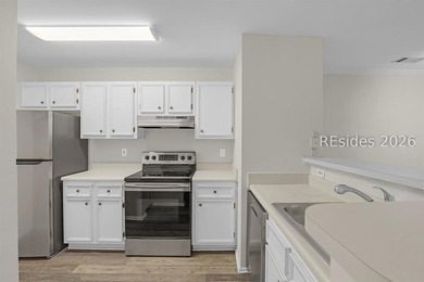 This first-floor 2 bedroom, 2 bath villa at The Reserve at - photo 3
