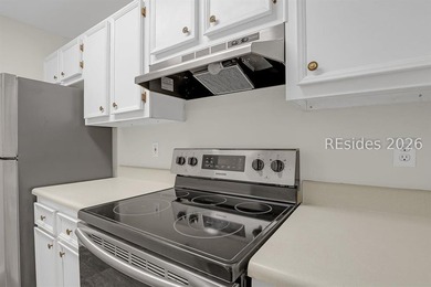 This first-floor 2 bedroom, 2 bath villa at The Reserve at - photo 4