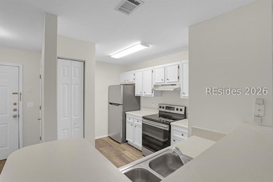 This first-floor 2 bedroom, 2 bath villa at The Reserve at - photo 5