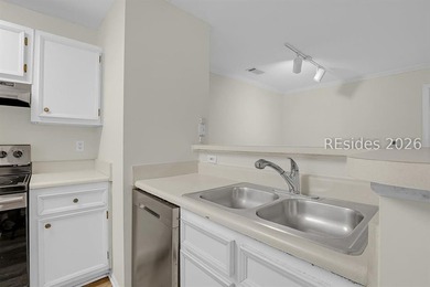 This first-floor 2 bedroom, 2 bath villa at The Reserve at - photo 8