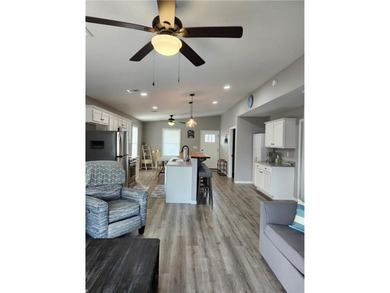 This almost-new home comes fully furnished and ready to make - photo 6