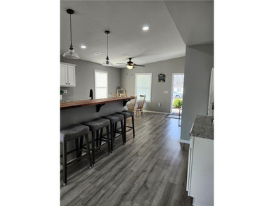 This almost-new home comes fully furnished and ready to make - photo 7