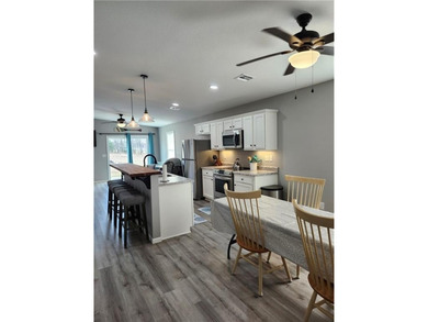 This almost-new home comes fully furnished and ready to make - photo 8