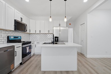 Step into this spacious 4 bedroom, 3 bathroom home set on a - photo 7