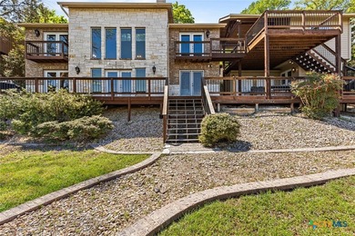 DISCOVER SERENE LAKE LIVING IN THIS EXCEPTIONAL 4 BEDROOM, 3.5 - photo 1