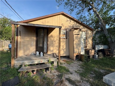 This 3-bedroom, 1-bath home sits on a large lot and offers - photo 11
