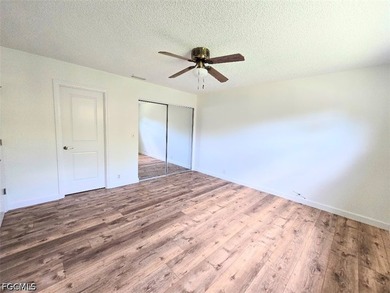 This REMODELED ATTACHED VILLA is located in the very Lushly - photo 12