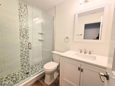 This REMODELED ATTACHED VILLA is located in the very Lushly - photo 17