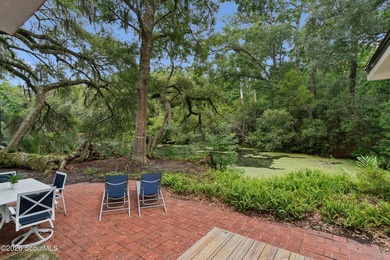 Tucked away on nearly a full acre on St. Simons Island, this - photo 32