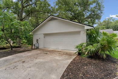 Tucked away on nearly a full acre on St. Simons Island, this - photo 45