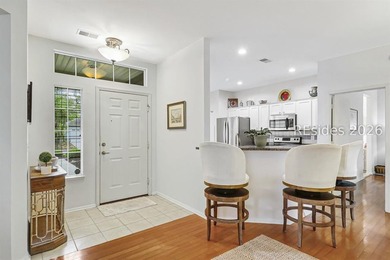Tucked beneath a canopy of mature trees on the desirable - photo 6