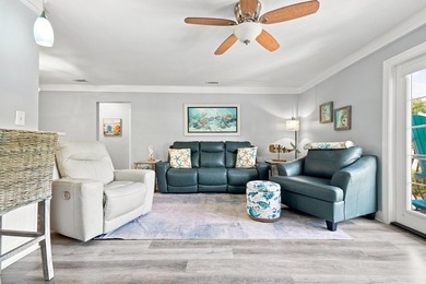 Discover Florida living in this tastefully remodeled 3-bedroom - photo 2
