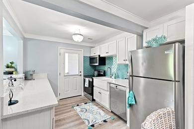 Discover Florida living in this tastefully remodeled 3-bedroom - photo 6