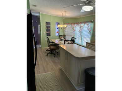 Leased Land Welcomes you to Pine Lakes! This large split-bedroom - photo 11