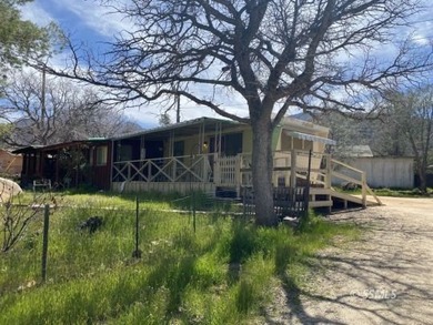 Wow, this 2-bedroom, 1.5 bath home has a HUGE 2 car garage with - photo 1