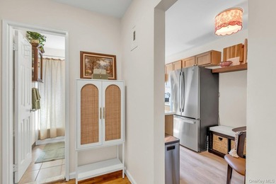 Beautifully updated and move-in ready, this charming co-op - photo 10