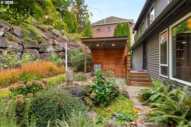 Set on a private half-acre at the end of a quiet street, this