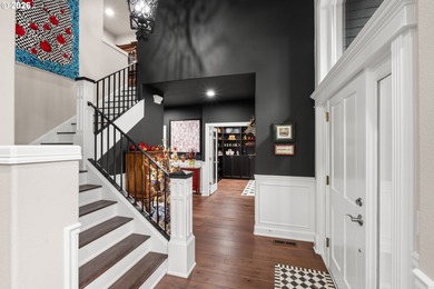 Set on a private half-acre at the end of a quiet street, this