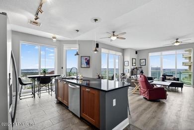 Luxury Riverfront Condominium with Stunning Views & High-End - photo 4